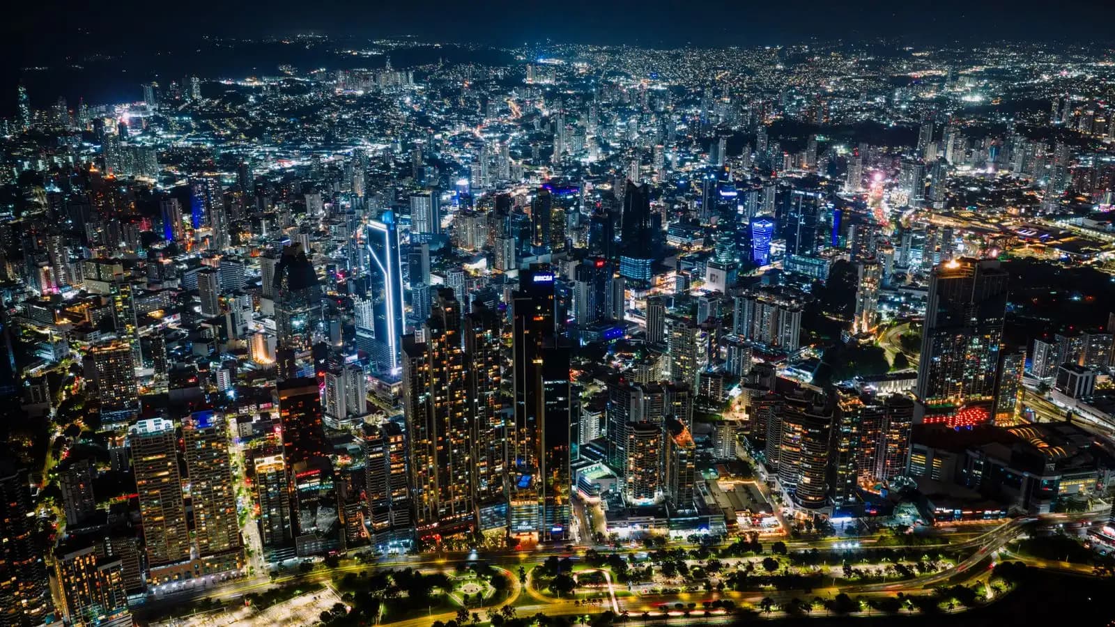 Aerial view of a city skyline lit up at night